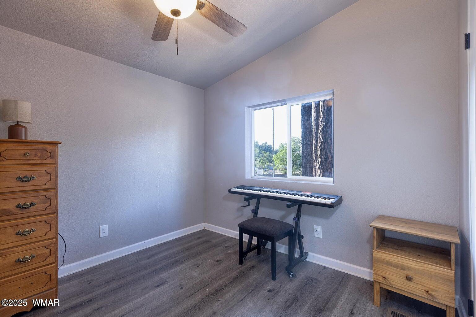430 Timber Ridge Loop Show Low, AZ 85901 - Photo 18 of 27 a view of a workspace with furniture and a window