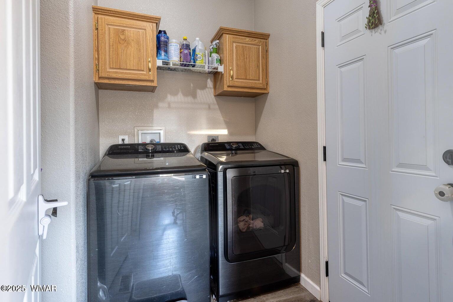 430 Timber Ridge Loop Show Low, AZ 85901 - Photo 19 of 27 a kitchen with stainless steel appliances granite countertop a stove and a refrigerator