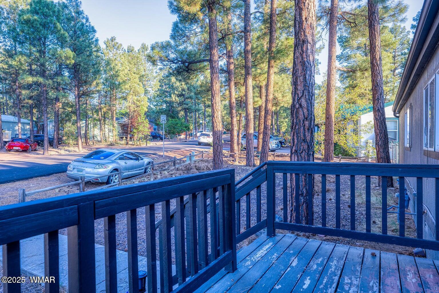430 Timber Ridge Loop Show Low, AZ 85901 - Photo 2 of 27 a view of wooden deck
