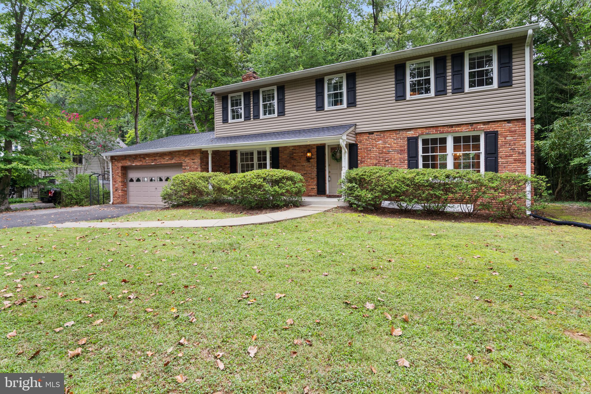 1643 Homewood Road Annapolis, MD 21409 - Photo 1 of 59 a front view of a house with yard and green space
