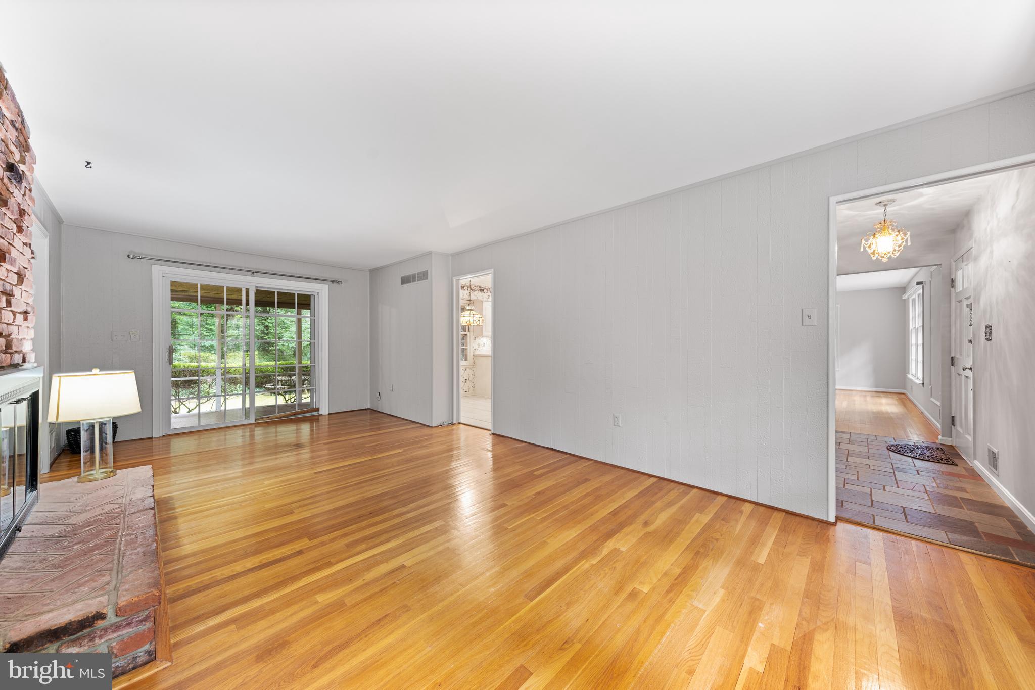 1643 Homewood Road Annapolis, MD 21409 - Photo 16 of 59 a view of empty room with wooden floor and fan
