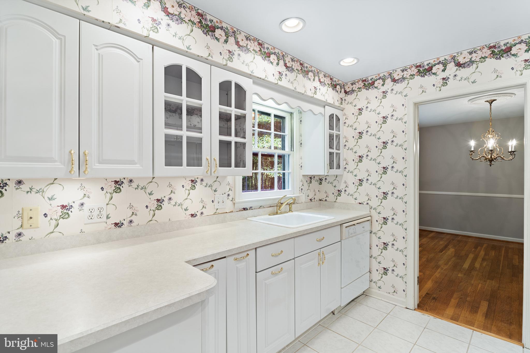 1643 Homewood Road Annapolis, MD 21409 - Photo 20 of 59 a bathroom with a sink and a mirror