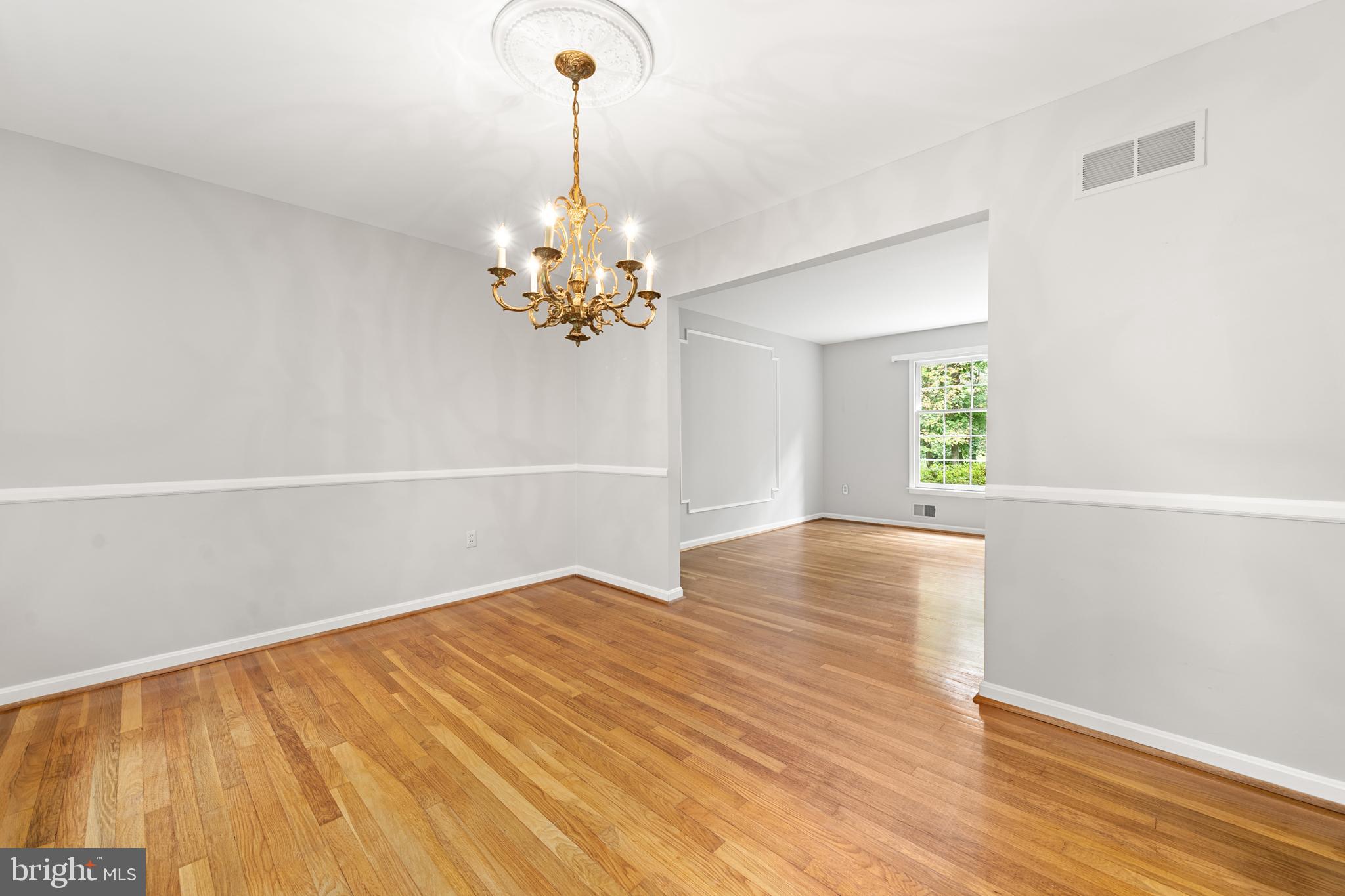 1643 Homewood Road Annapolis, MD 21409 - Photo 27 of 59 a view of empty room with window and wooden floor