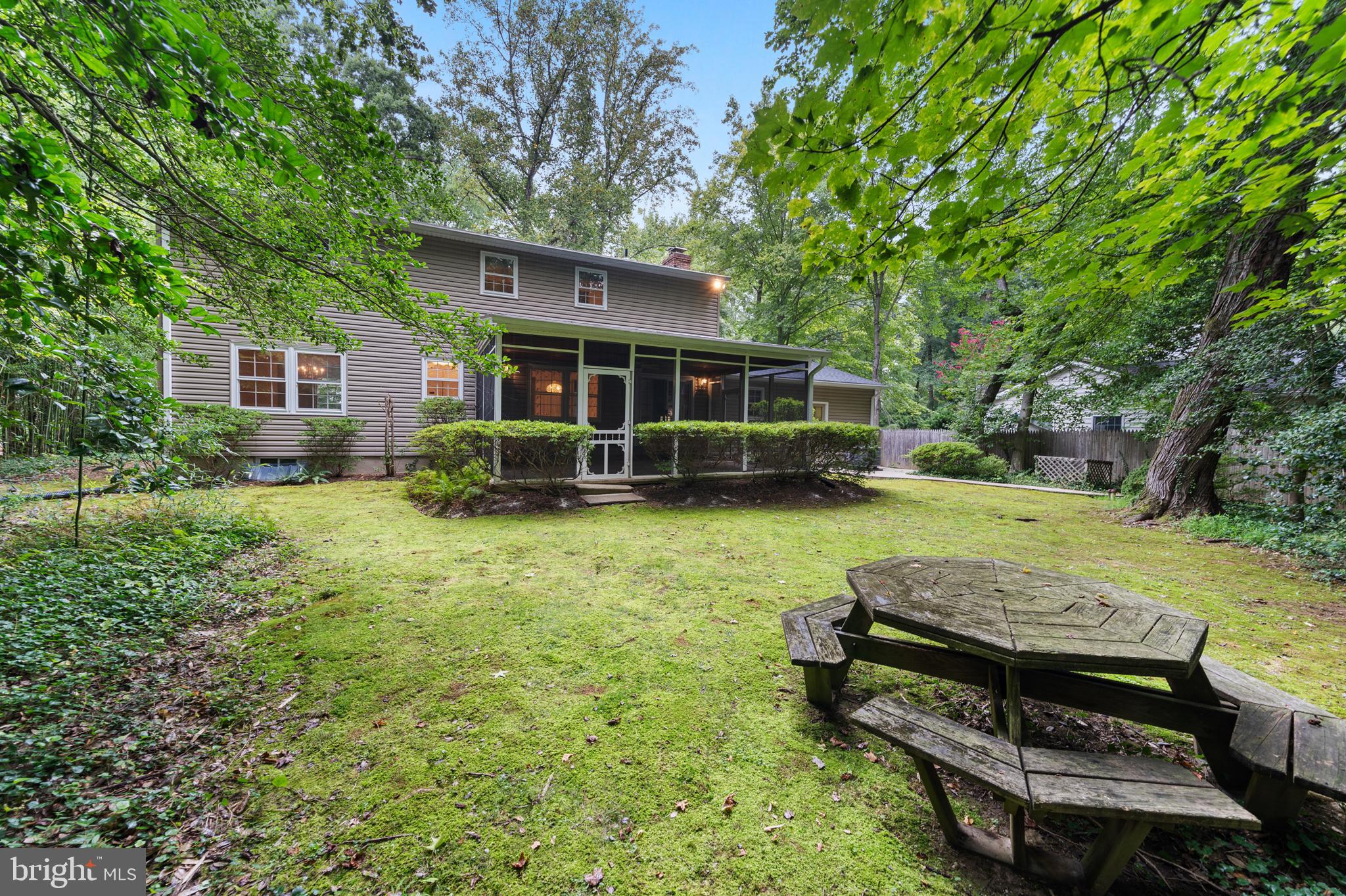 1643 Homewood Road Annapolis, MD 21409 - Photo 8 of 59 a view of a house with a backyard and a patio
