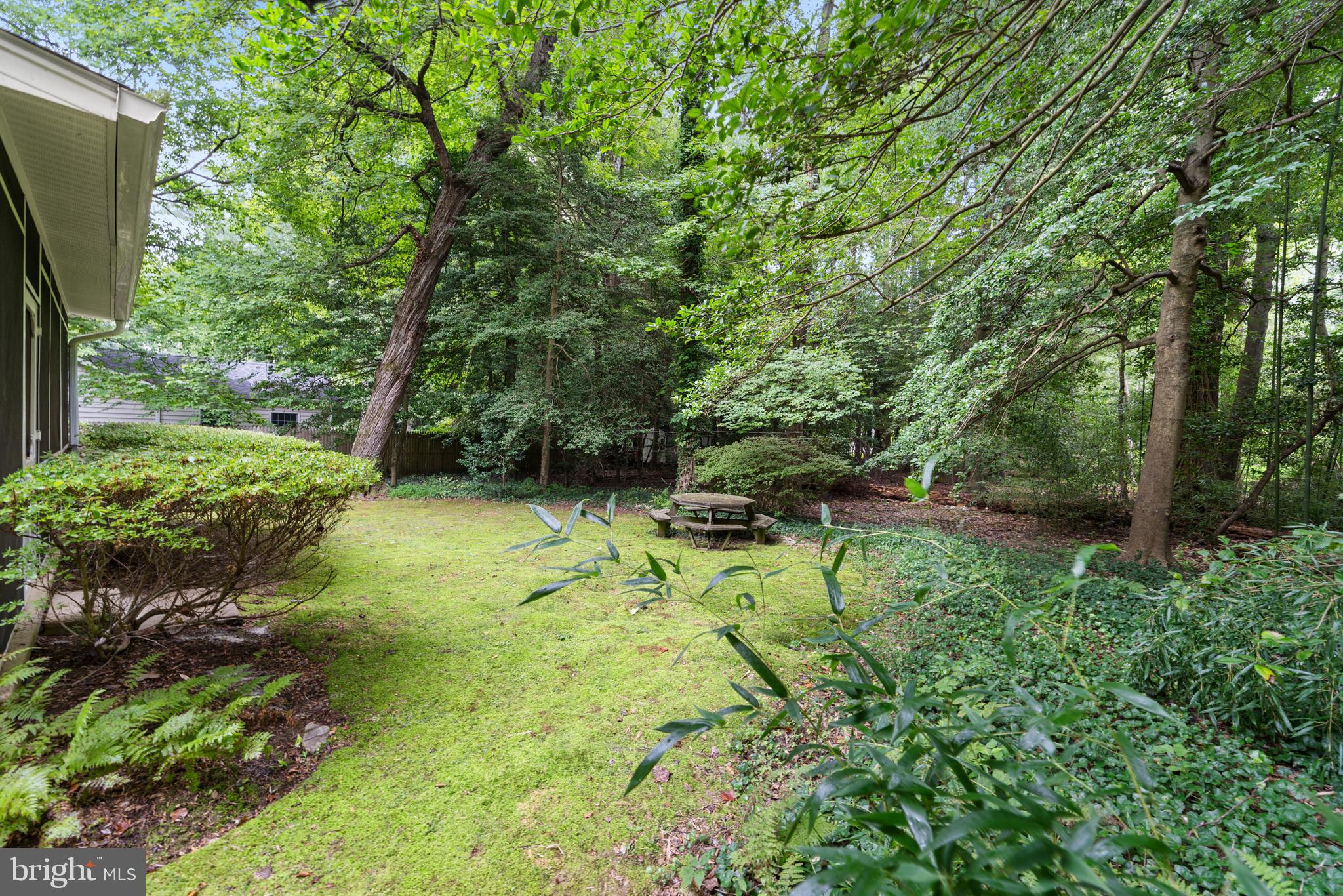 1643 Homewood Road Annapolis, MD 21409 - Photo 9 of 59 a backyard of a house with a yard and outdoor seating