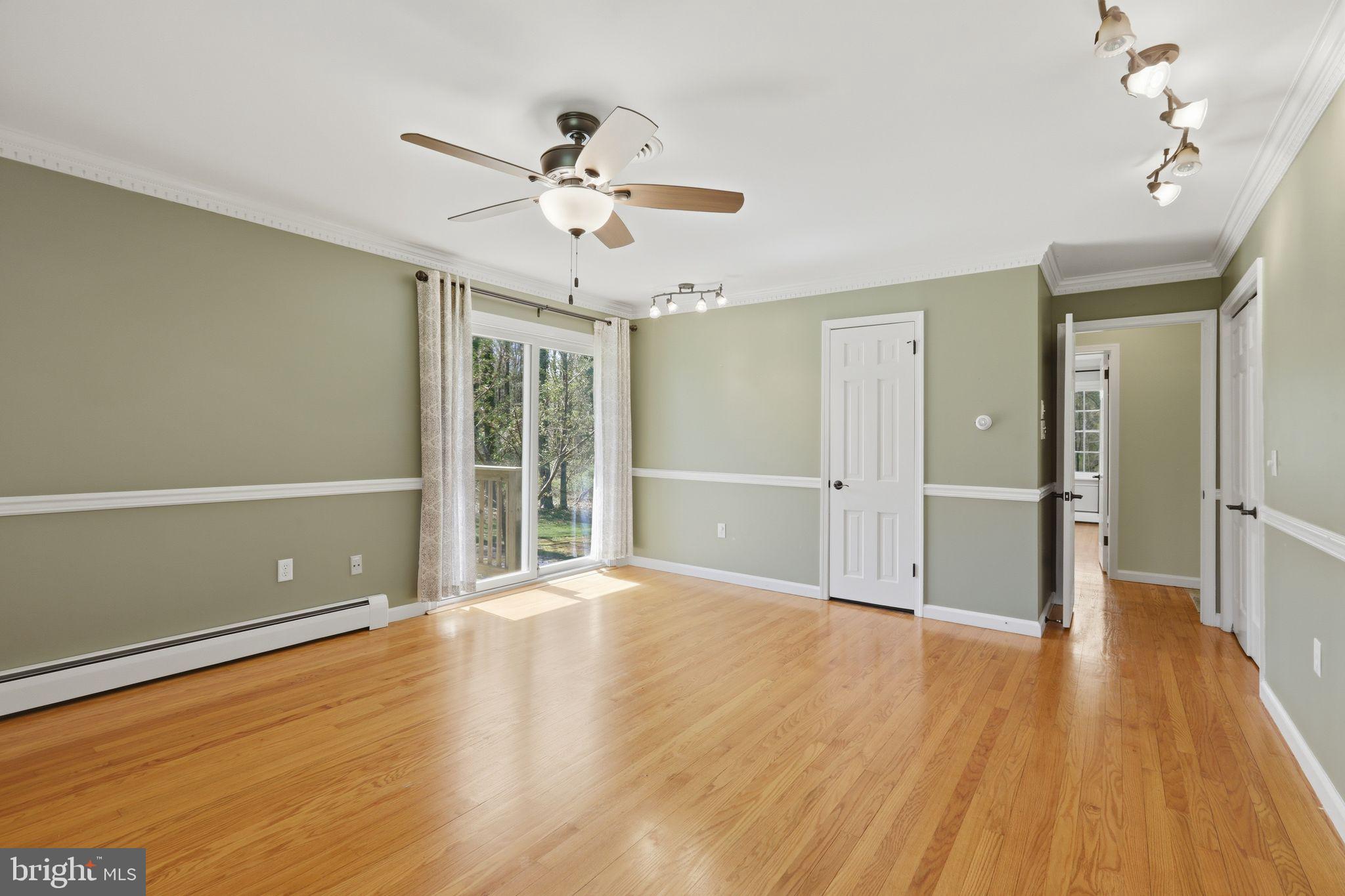 35 Oriole Way Moorestown, NJ 08057 - Photo 19 of 45 a view of an empty room with wooden floor