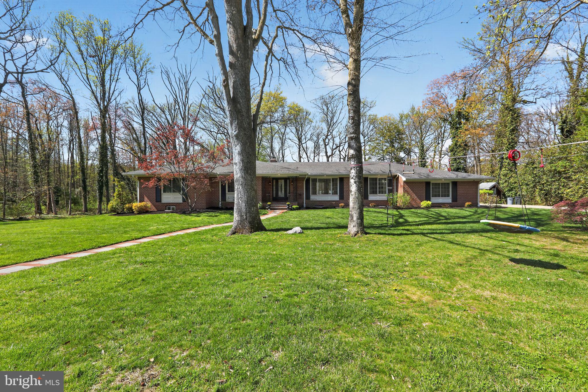 35 Oriole Way Moorestown, NJ 08057 - Photo 2 of 45 a view of a house with a big yard and large trees