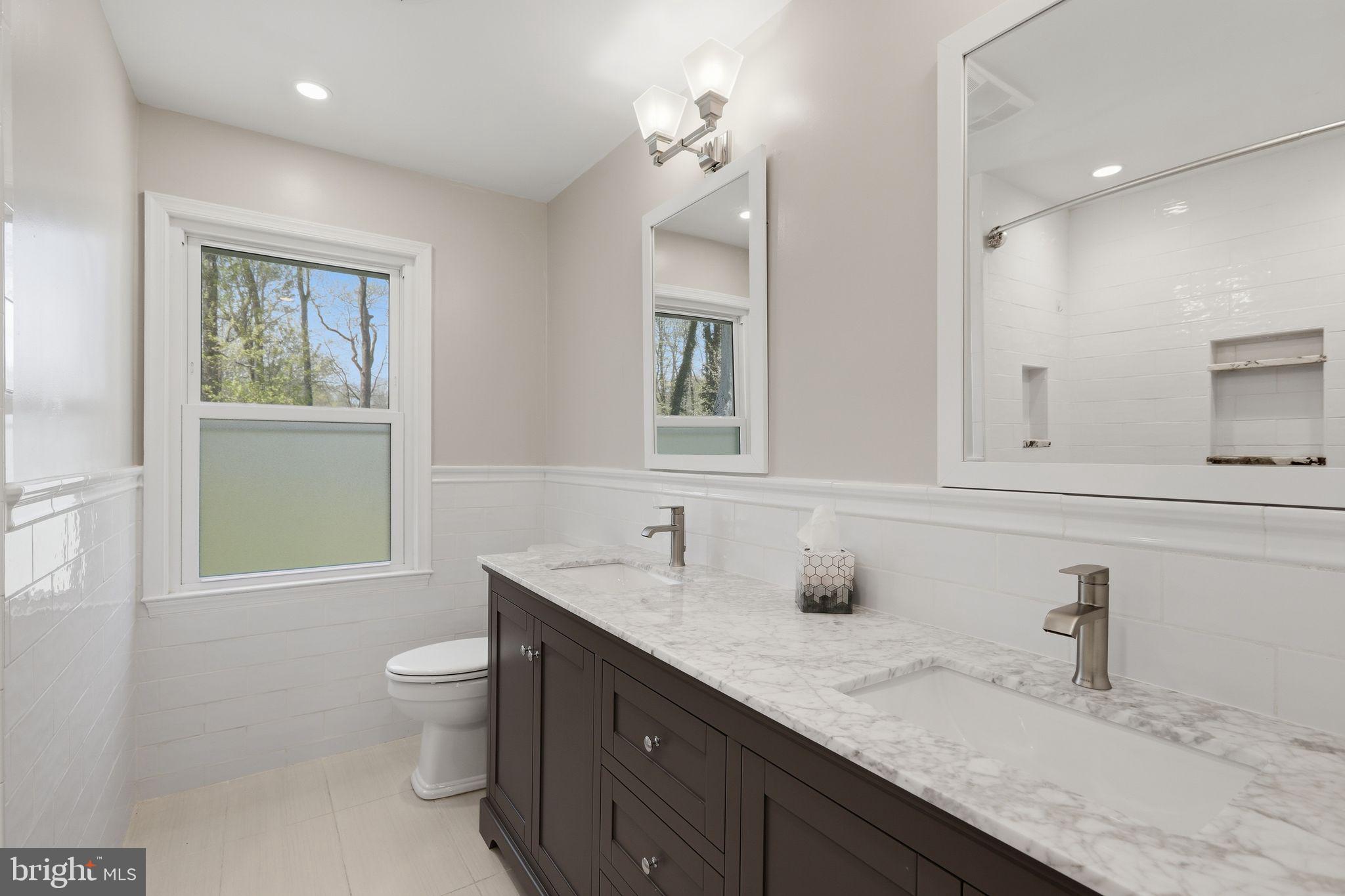 35 Oriole Way Moorestown, NJ 08057 - Photo 29 of 45 a bathroom with a granite countertop sink mirror vanity and toilet