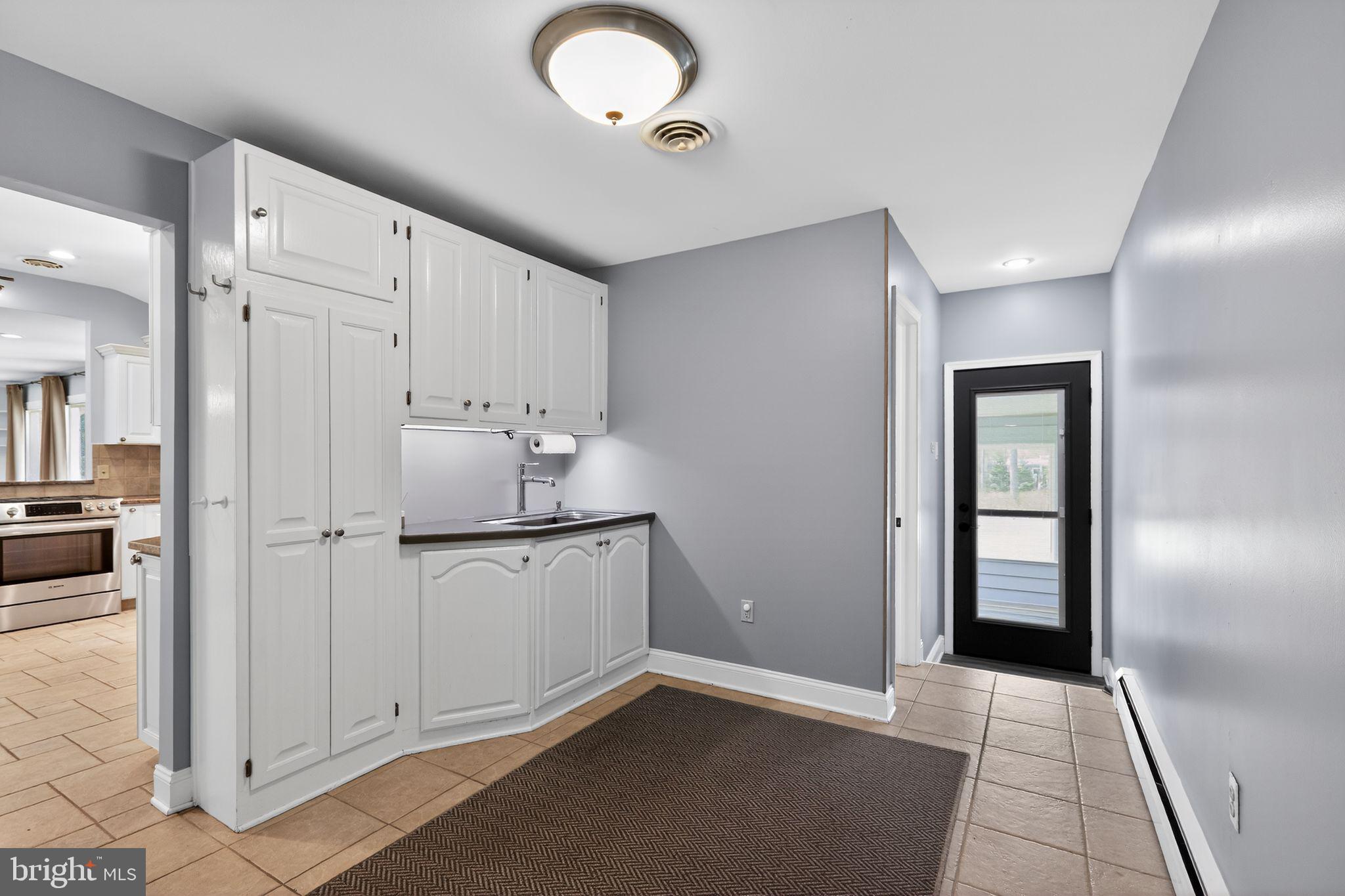 35 Oriole Way Moorestown, NJ 08057 - Photo 30 of 45 a kitchen with stainless steel appliances granite countertop a refrigerator and a sink
