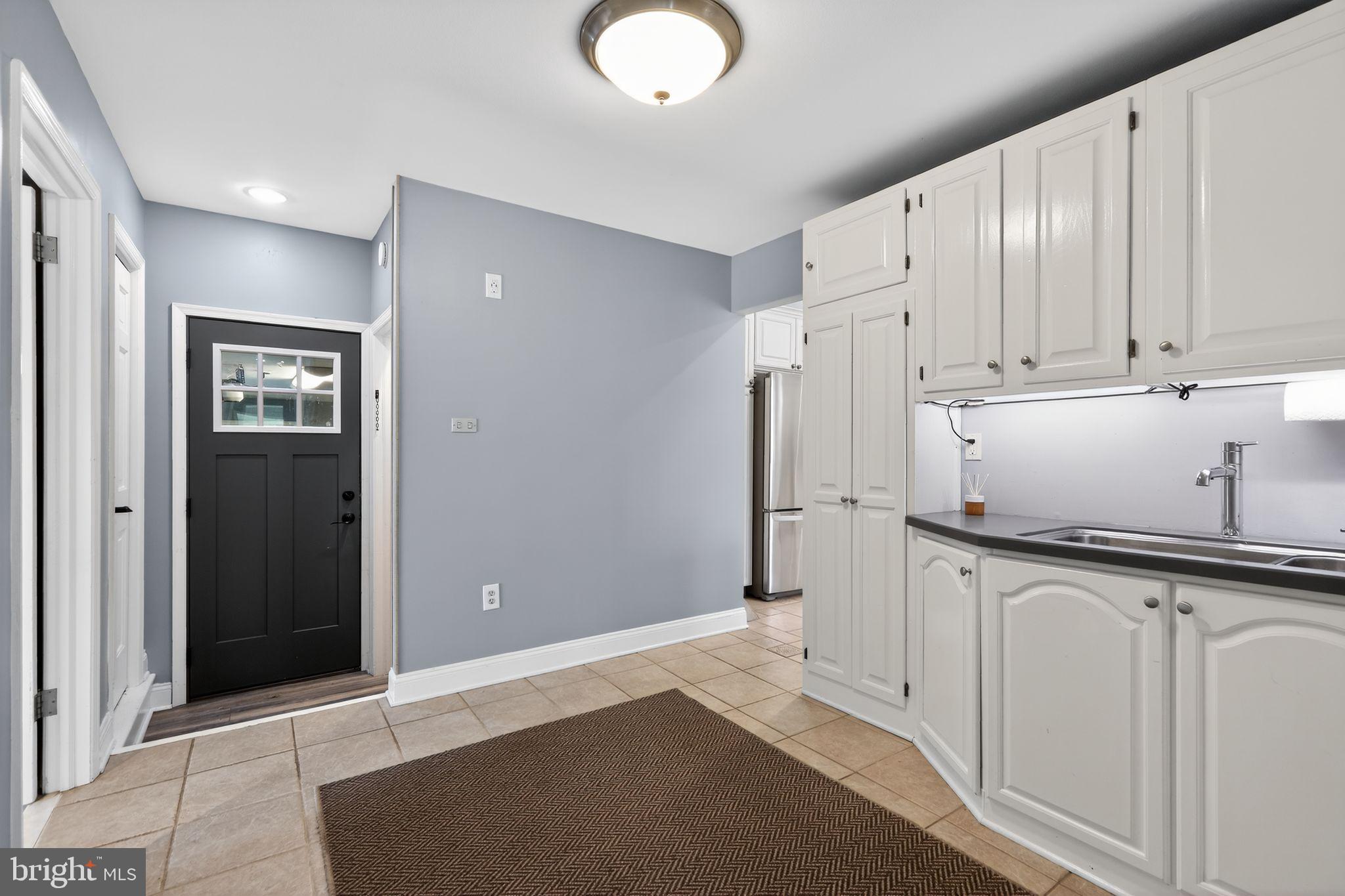 35 Oriole Way Moorestown, NJ 08057 - Photo 31 of 45 a kitchen with granite countertop white cabinets and white appliances