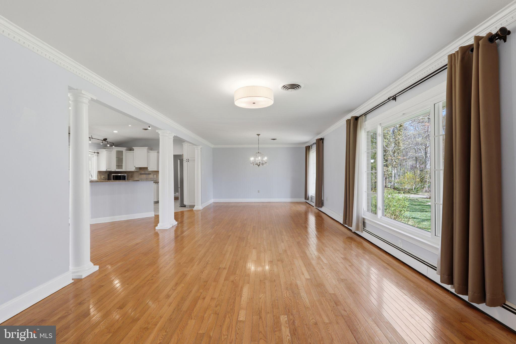 35 Oriole Way Moorestown, NJ 08057 - Photo 5 of 45 a view of empty room with wooden floor and fan