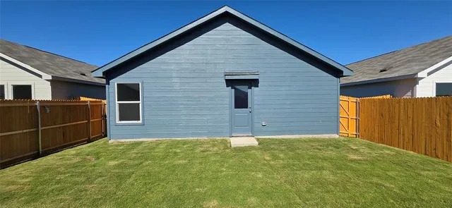 a view of backyard of house