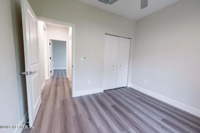 a view of a backyard of the house