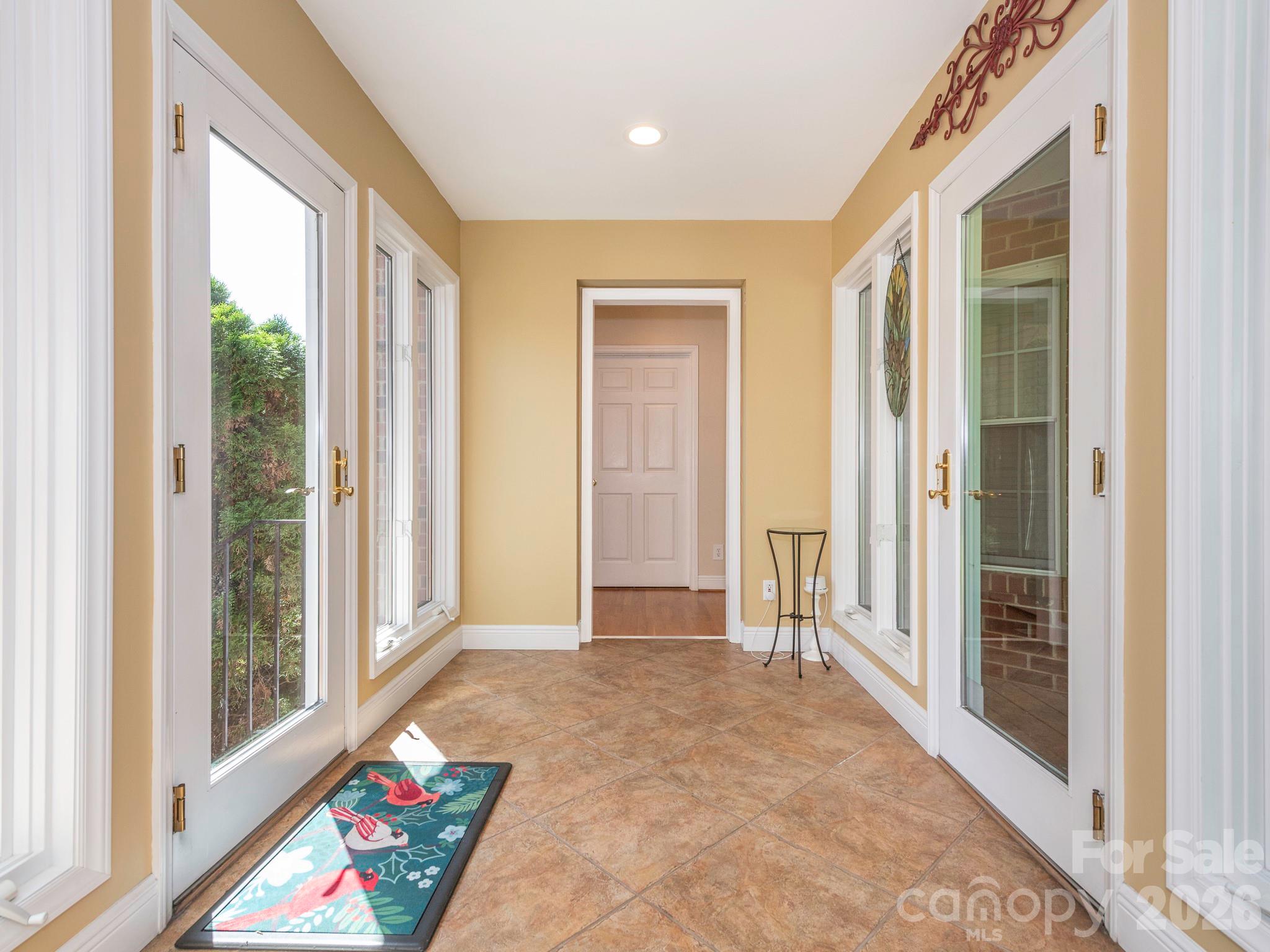 4440 Hucks Road Charlotte, NC 28269 - Photo 32 of 45 a view of an entryway with wooden floor