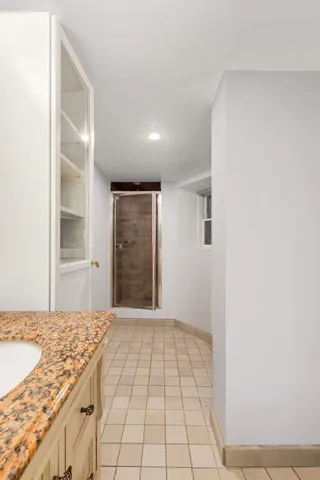 a view of a balcony with chairs