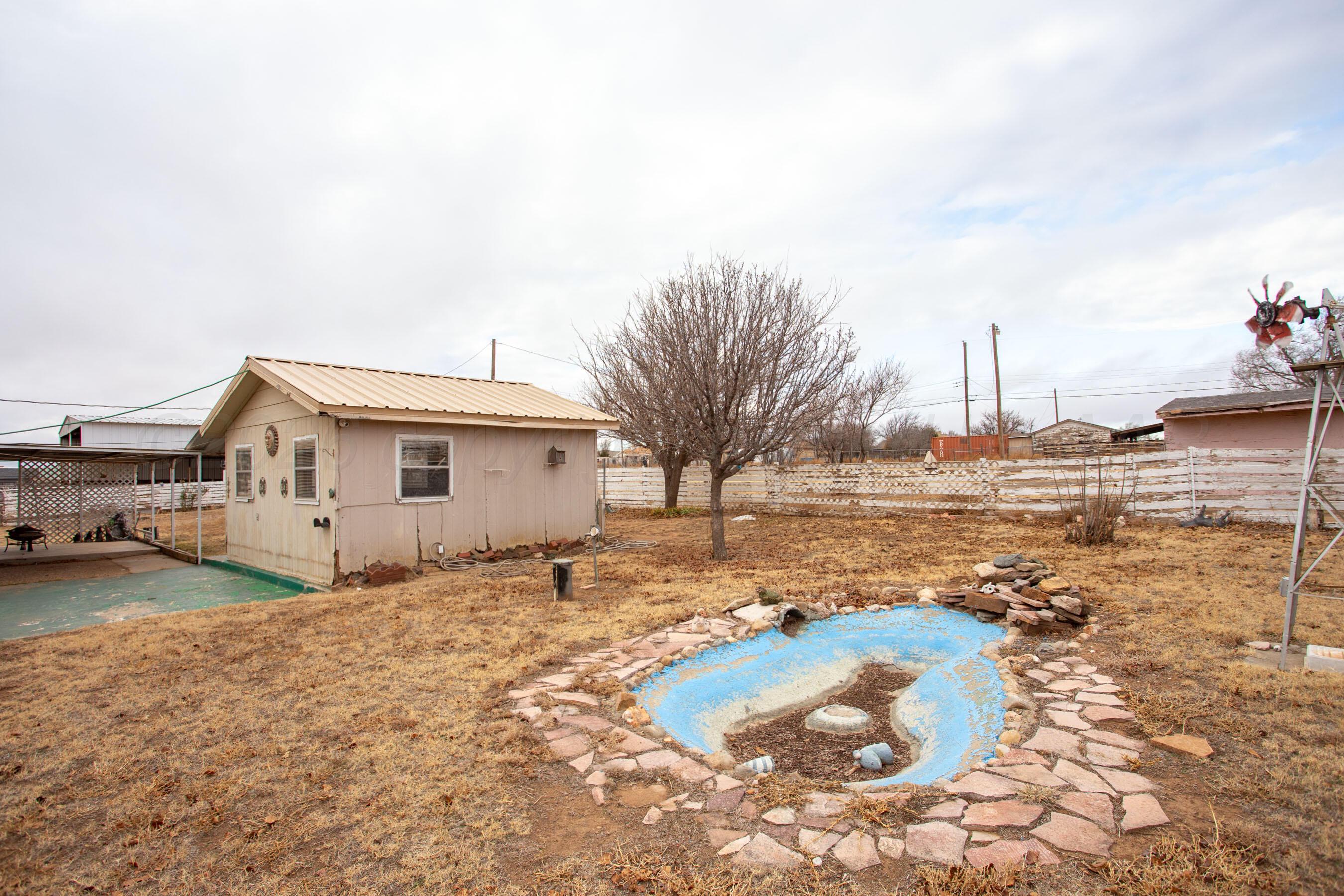 106 Renegade Trail Amarillo, TX 79108 - Photo 25 of 33 a view of a house with a yard