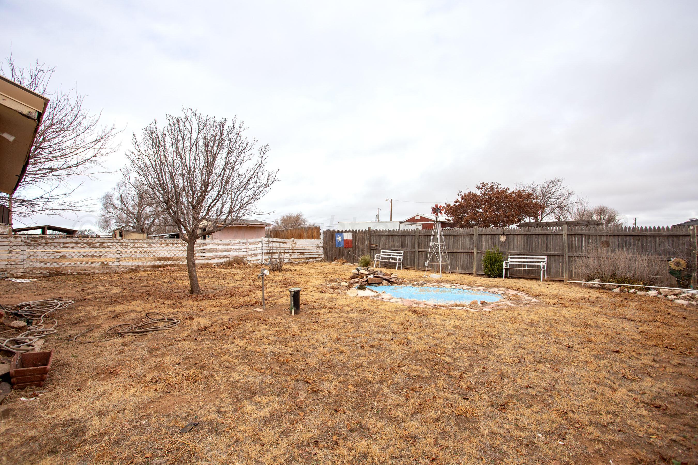 106 Renegade Trail Amarillo, TX 79108 - Photo 26 of 33 a view of a yard with wooden fence