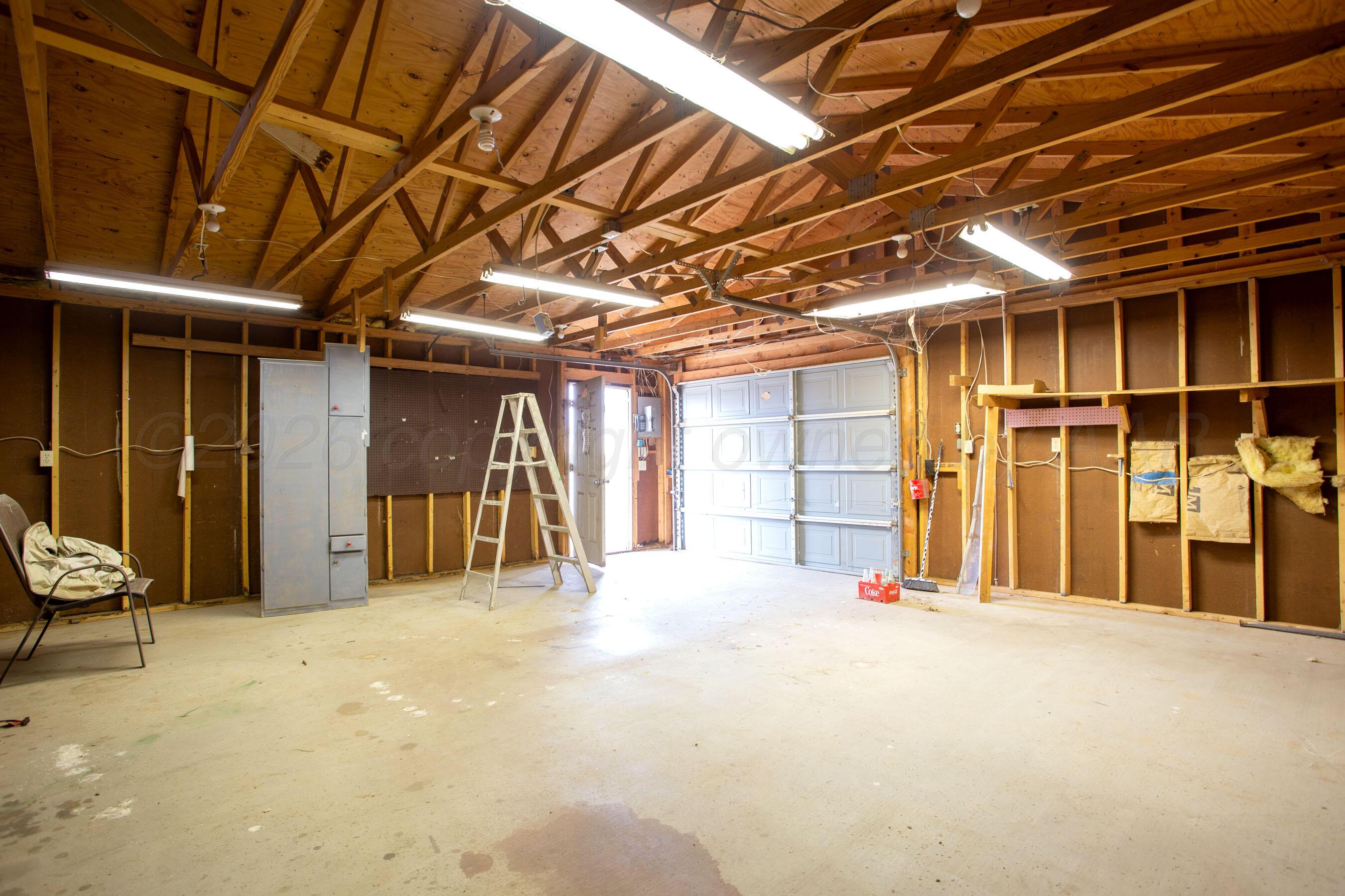 106 Renegade Trail Amarillo, TX 79108 - Photo 29 of 33 a view of a room with wooden walls