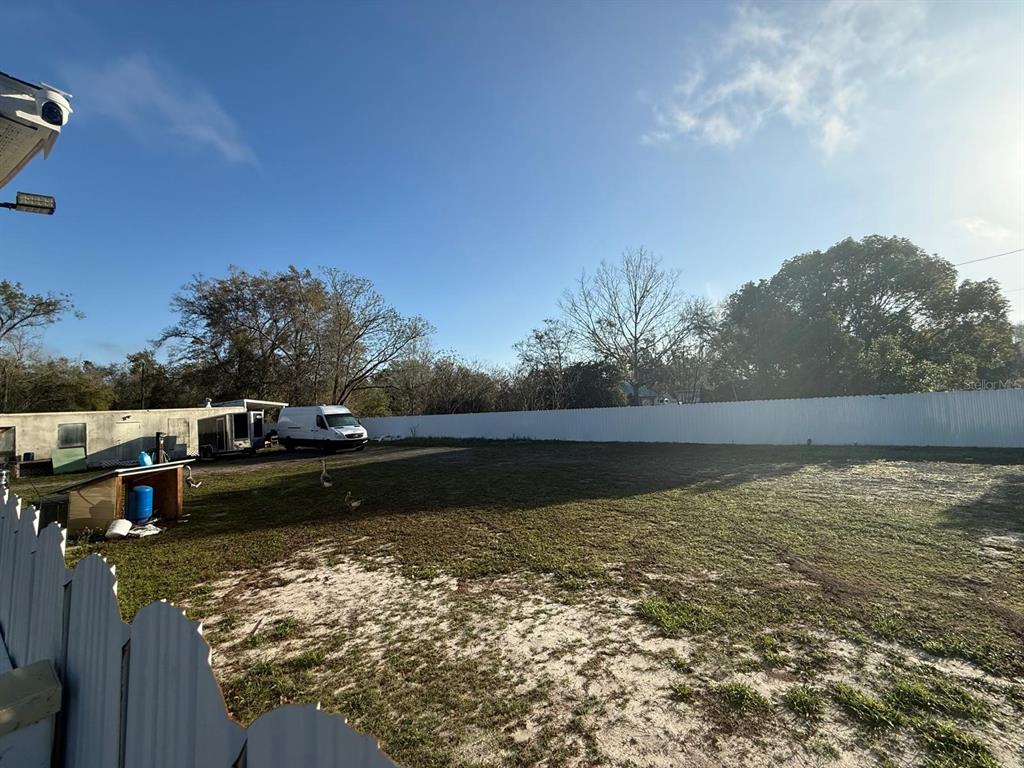 17151 Lemon Street Spring Hill, FL 34610 - Photo 17 of 18 a view of a lake with a mountain in the background