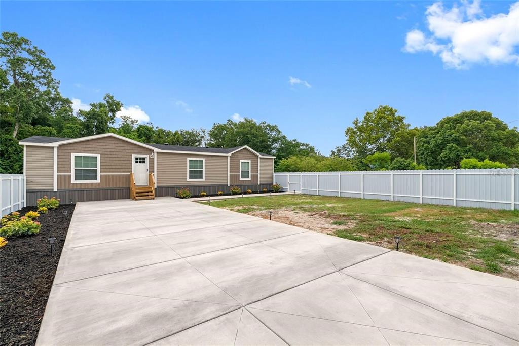 17151 Lemon Street Spring Hill, FL 34610 - Photo 2 of 18 a view of swimming pool with a backyard