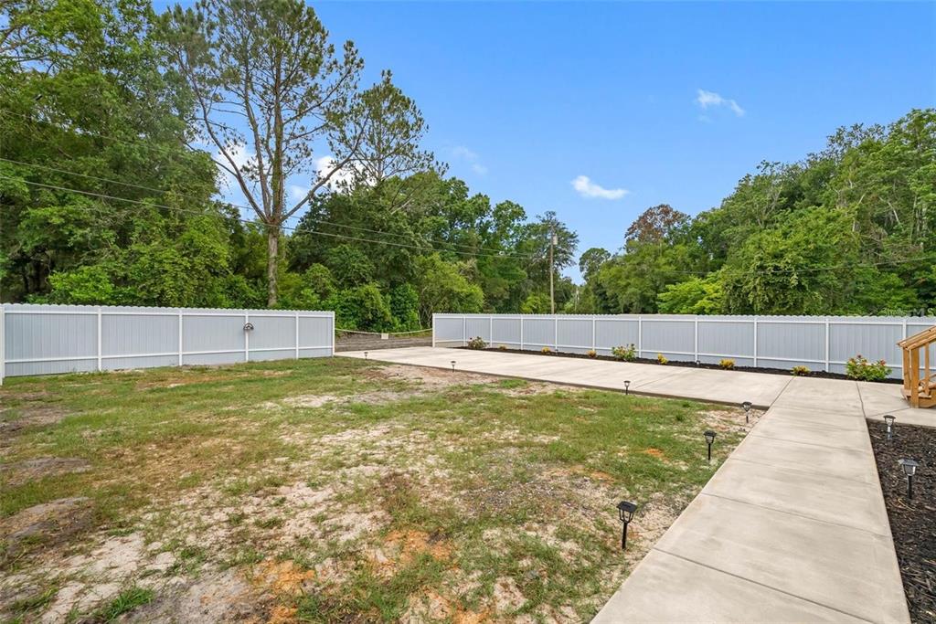 17151 Lemon Street Spring Hill, FL 34610 - Photo 6 of 18 a view of swimming pool with a yard