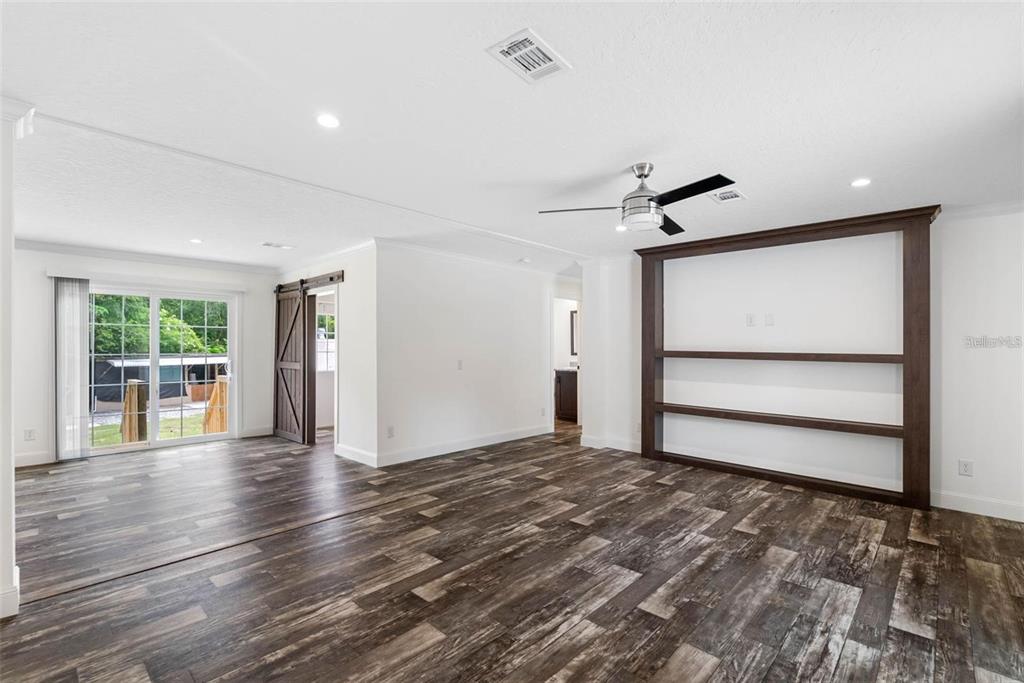17151 Lemon Street Spring Hill, FL 34610 - Photo 7 of 18 a view of an empty room with a window