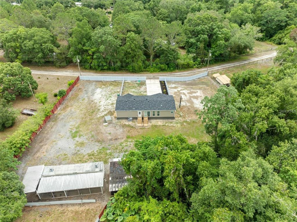 17151 Lemon Street Spring Hill, FL 34610 - Photo 10 of 18 an aerial view of a house with yard