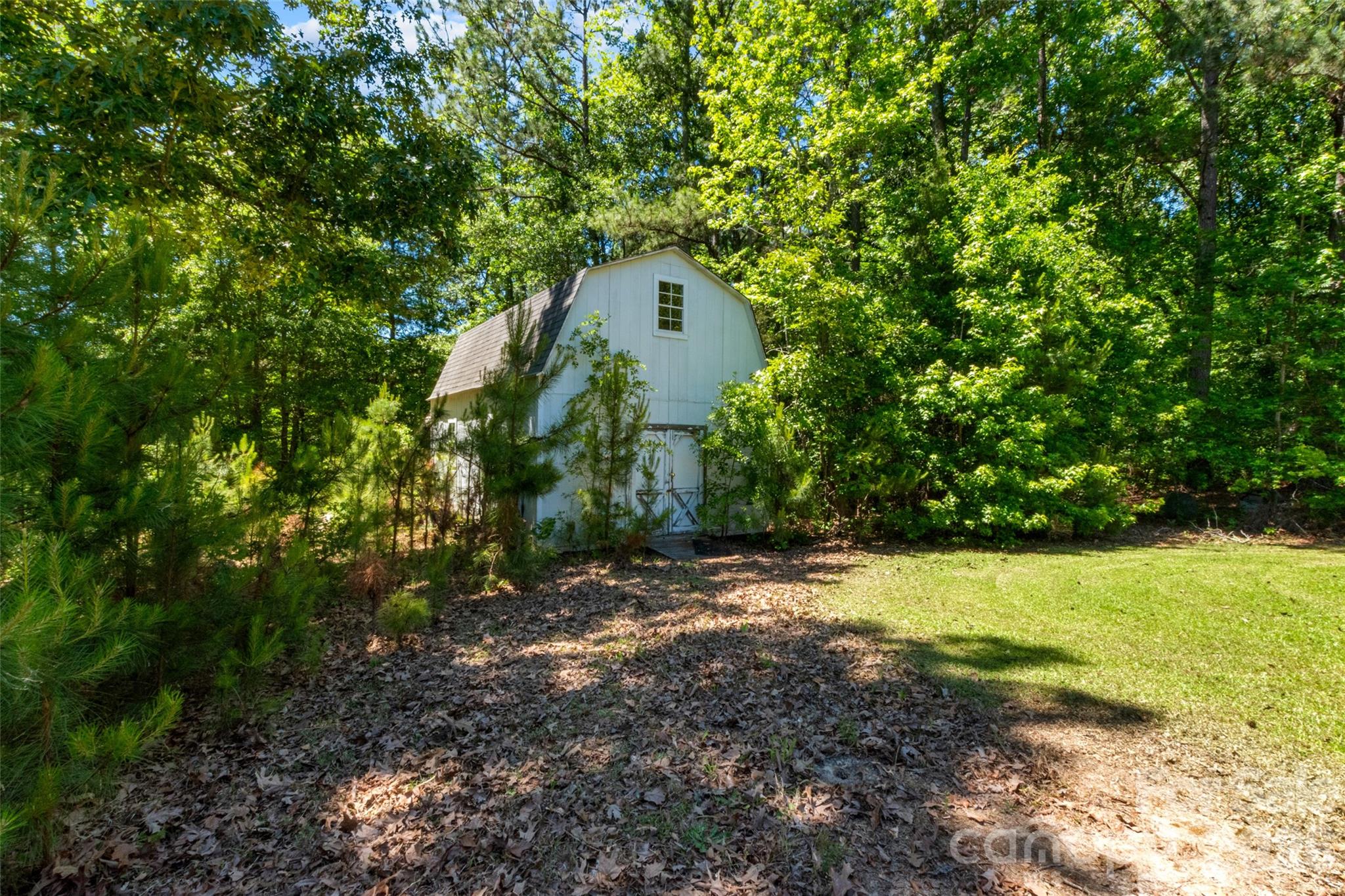434 Rutledge Drive Catawba, SC 29704 - Photo 36 of 39 a backyard of a house with a yard and tree
