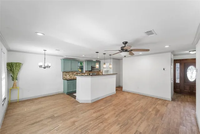 a view of a kitchen with a sink and dishwasher