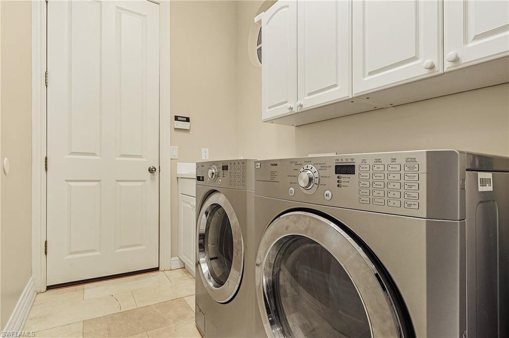20002 Grande Lake Drive Estero, FL 33928 - Photo 24 of 38 a utility room with dryer and washer