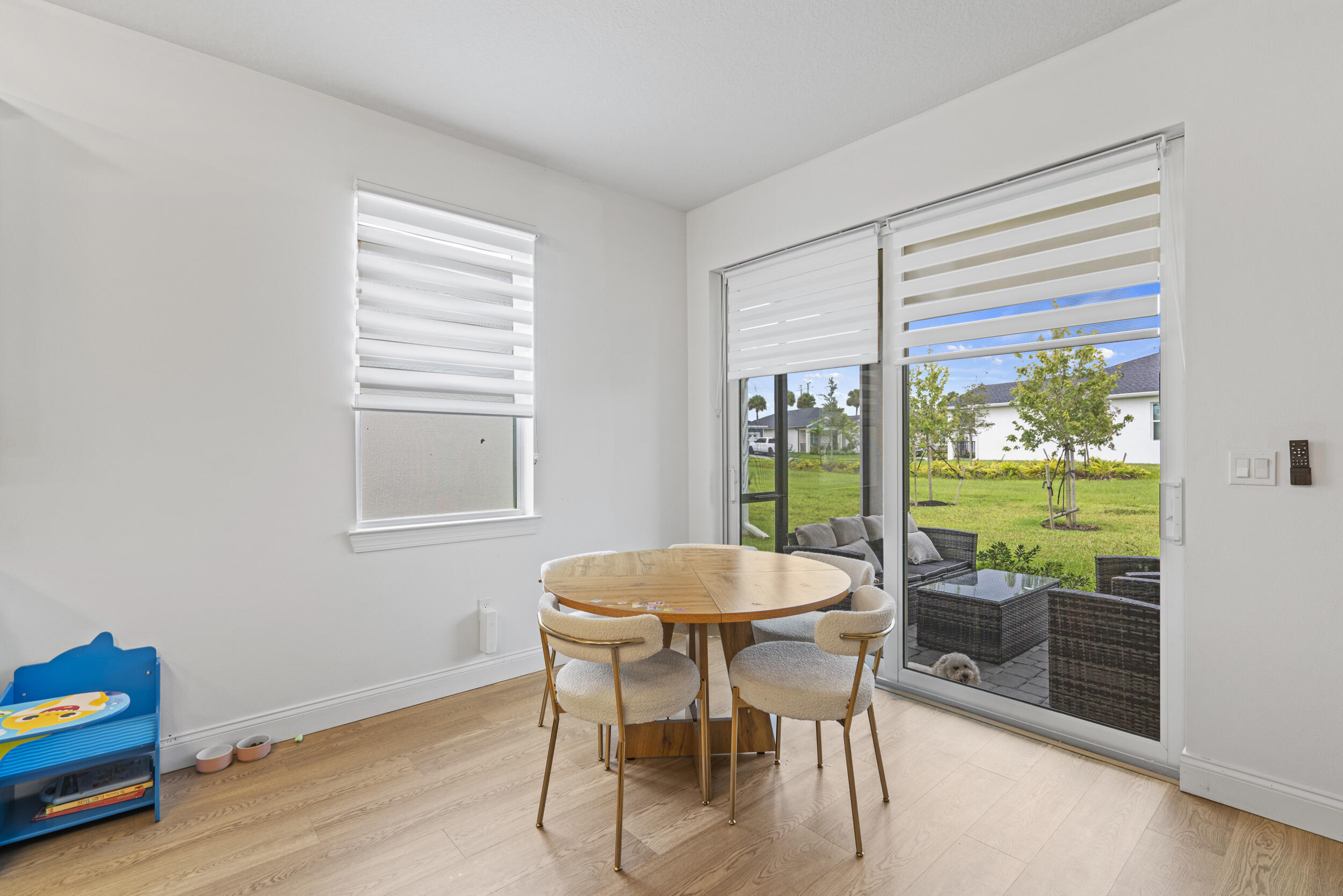 8906 Dahlia Circle Port St. Lucie, FL 34986 - Photo 13 of 47 a dining room with furniture and window