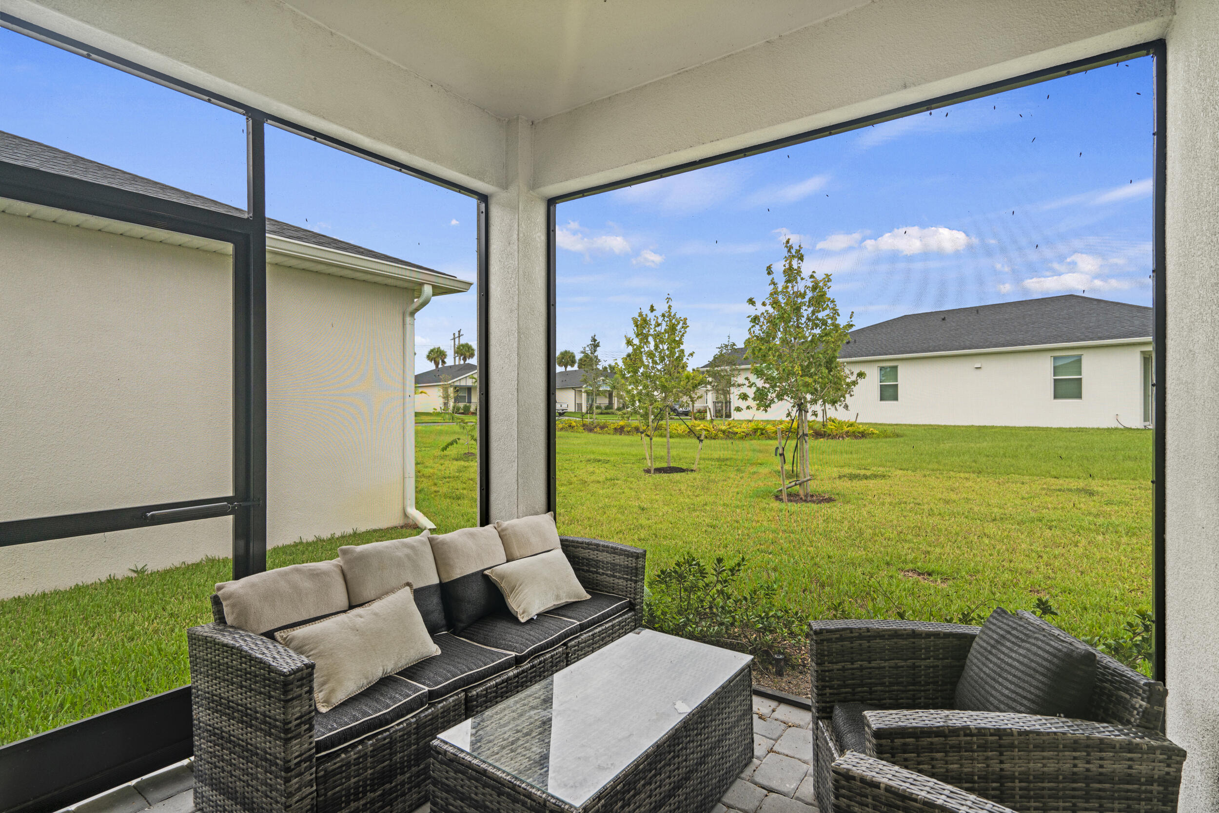 8906 Dahlia Circle Port St. Lucie, FL 34986 - Photo 31 of 47 a outdoor living space with furniture and garden view