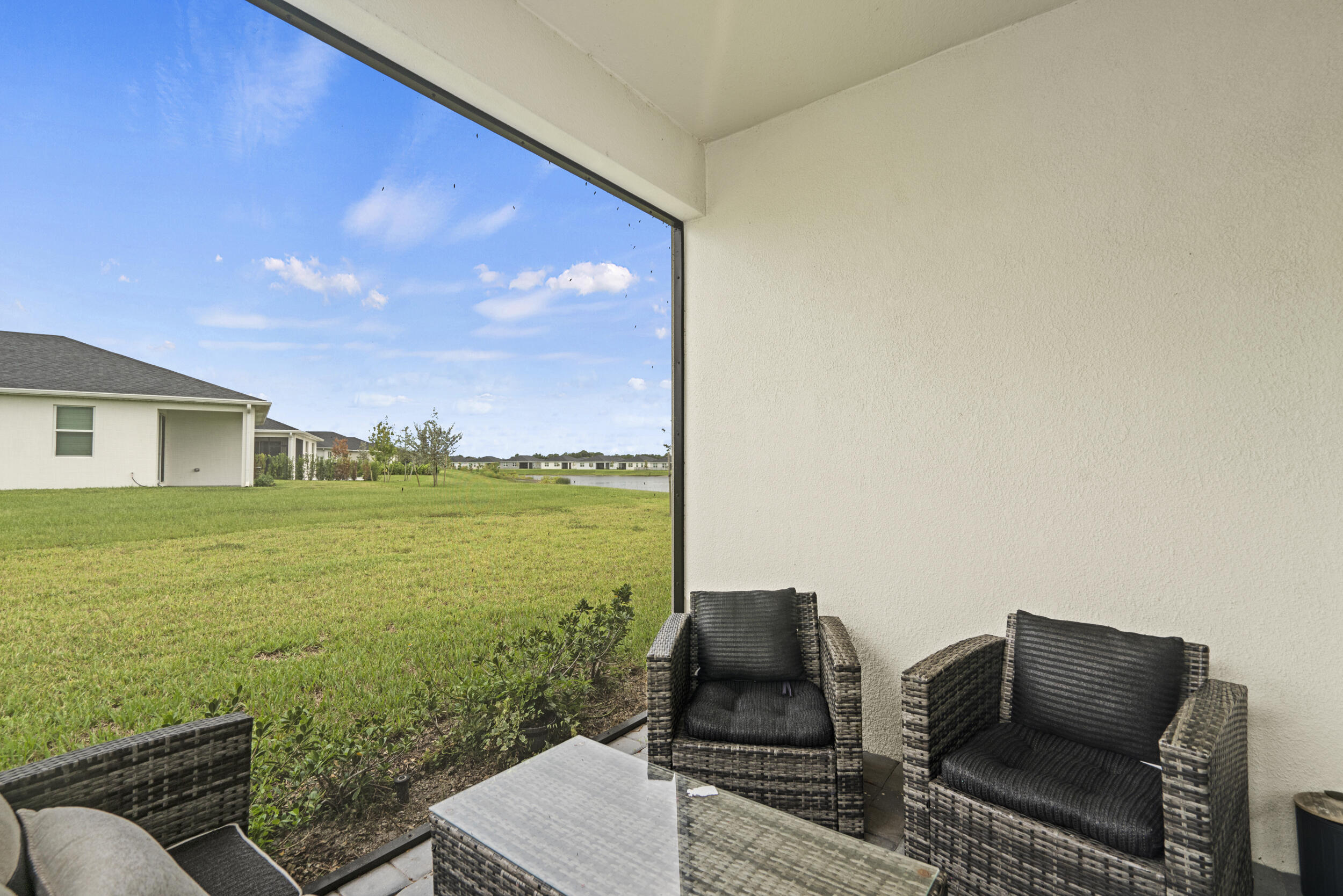 8906 Dahlia Circle Port St. Lucie, FL 34986 - Photo 32 of 47 a living room with furniture