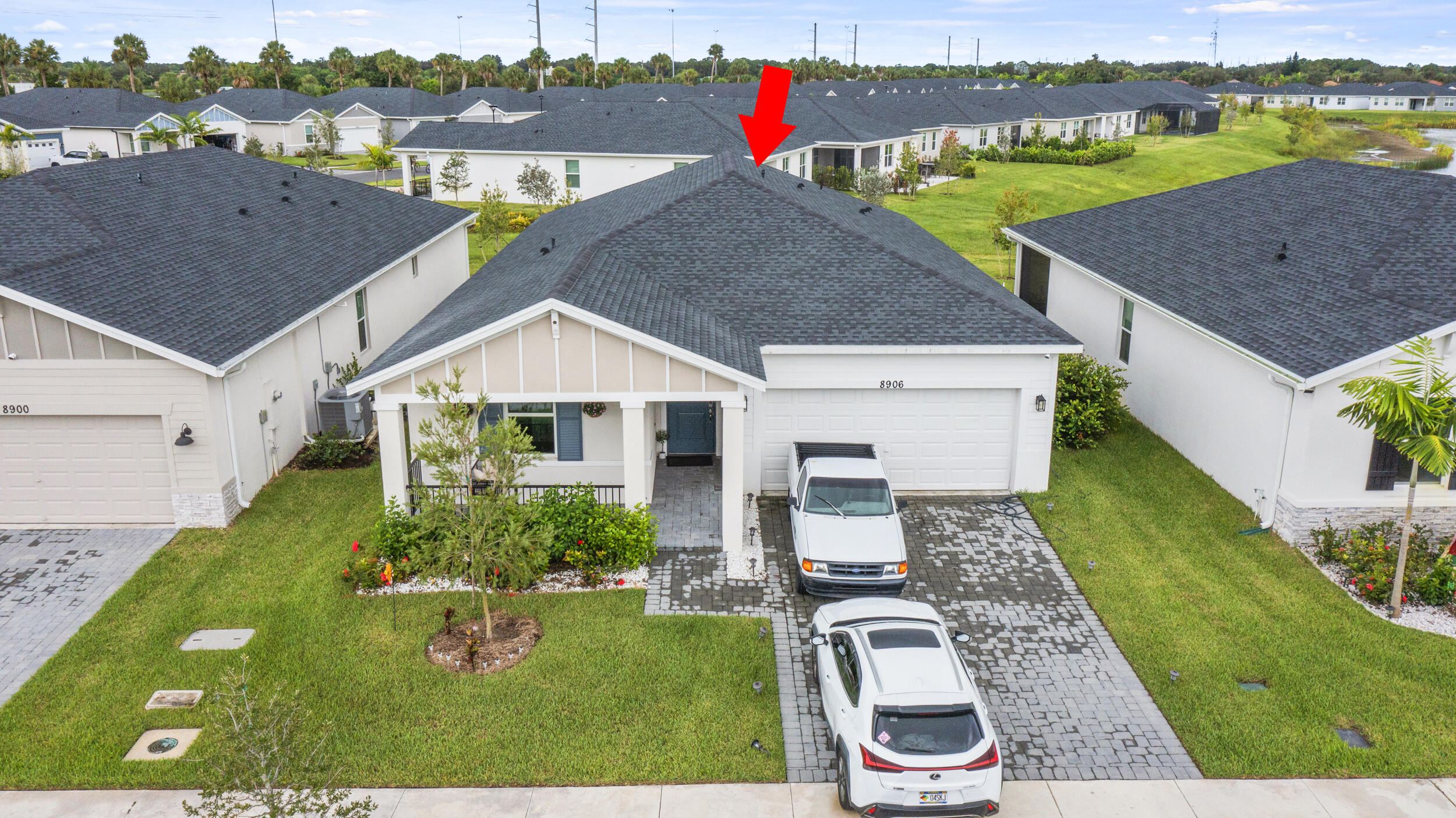 8906 Dahlia Circle Port St. Lucie, FL 34986 - Photo 38 of 47 an aerial view of a house with yard