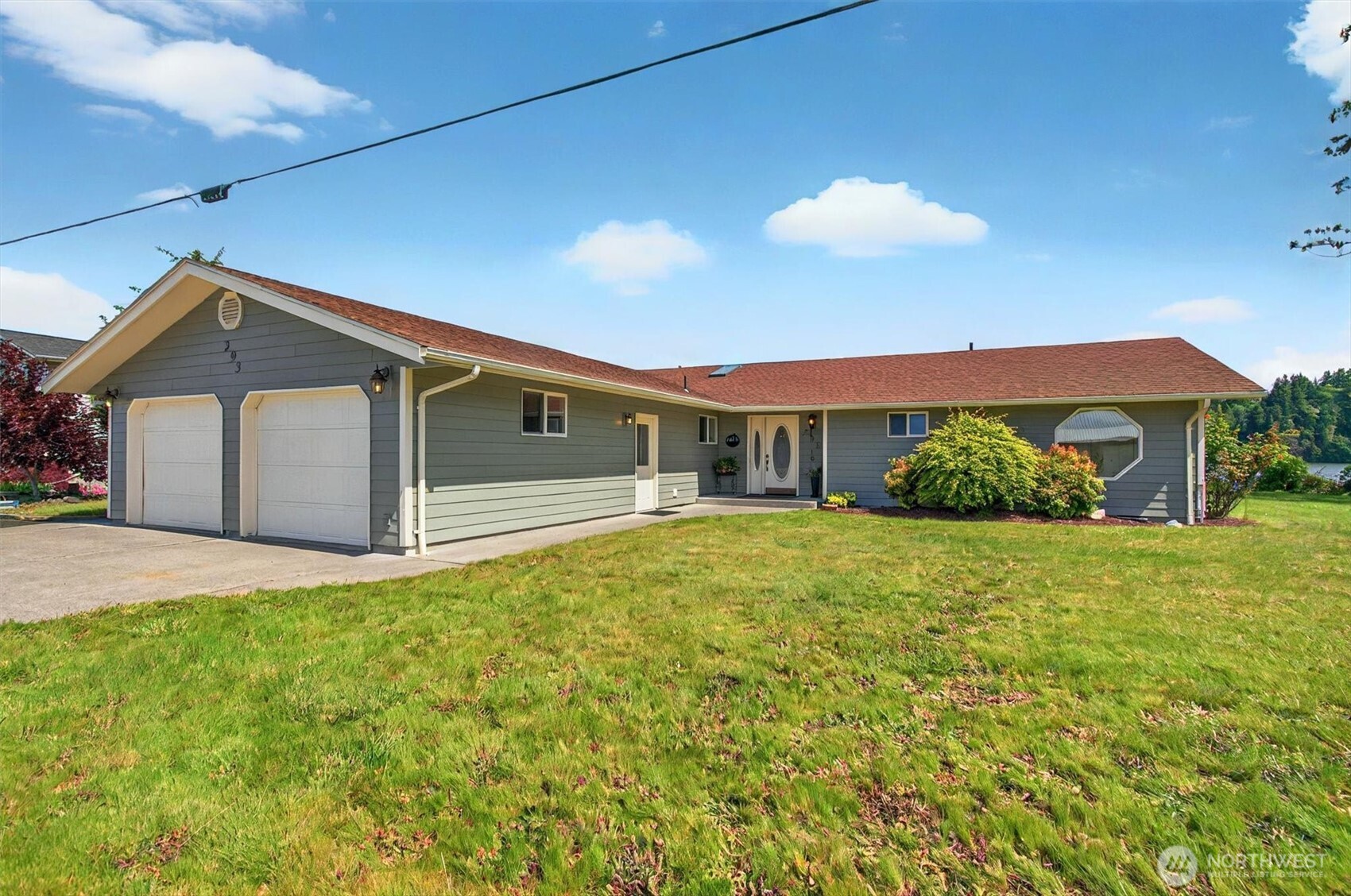 293 Highway 409 Cathlamet, WA 98612 - Photo 31 of 39 a house view with a garden space
