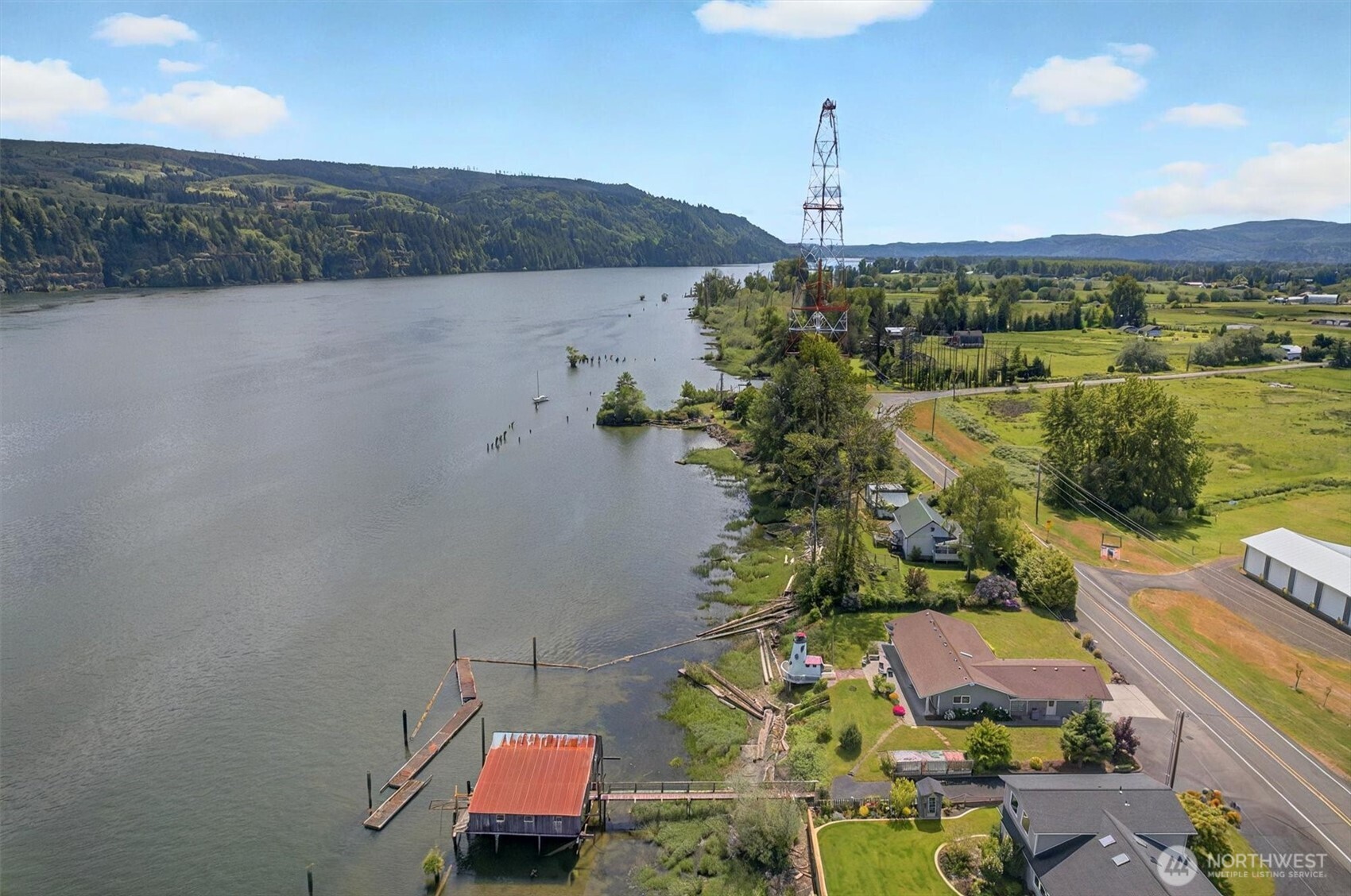 293 Highway 409 Cathlamet, WA 98612 - Photo 35 of 39 an aerial view of a house with a lake view