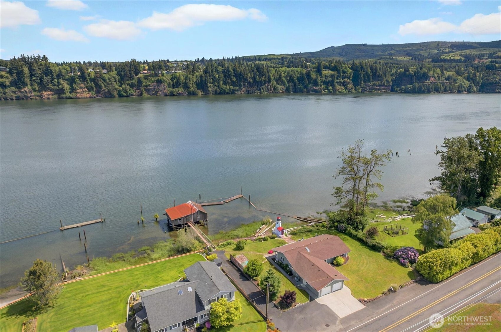 293 Highway 409 Cathlamet, WA 98612 - Photo 38 of 39 an aerial view of a house with a lake view