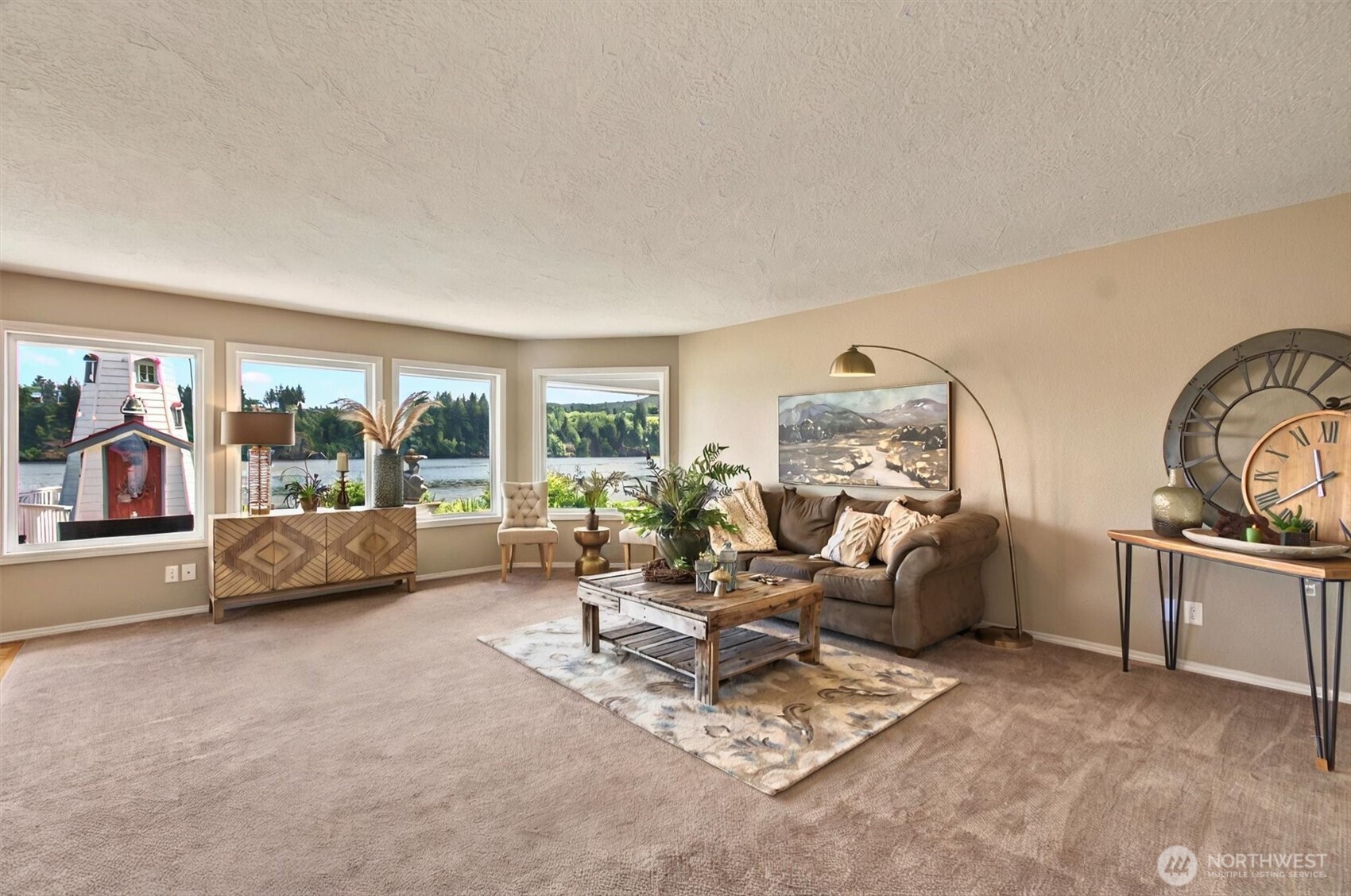 293 Highway 409 Cathlamet, WA 98612 - Photo 6 of 39 a living room with furniture and a flat screen tv