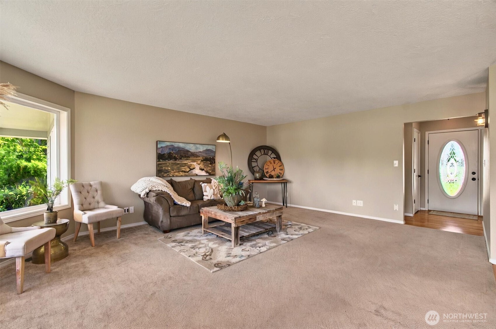 293 Highway 409 Cathlamet, WA 98612 - Photo 8 of 39 a living room with furniture a window and a fireplace