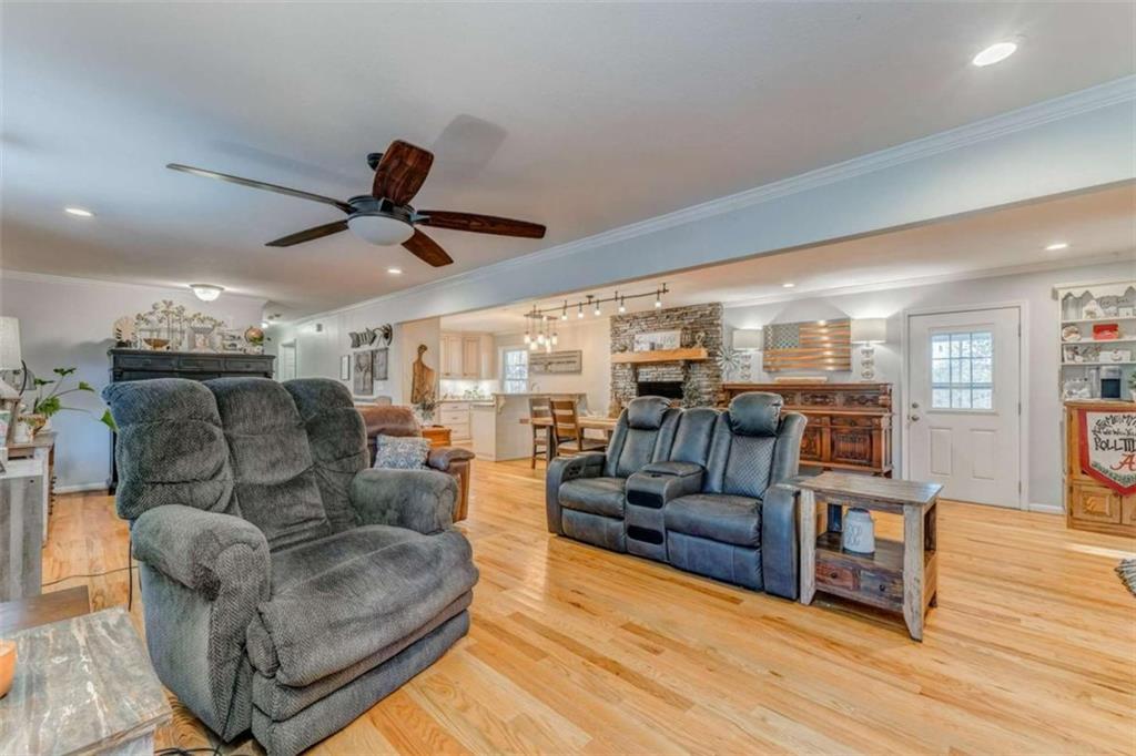 1522 Collard Valley Road Cedartown, GA 30125 - Photo 11 of 56 a living room with furniture and wooden floor