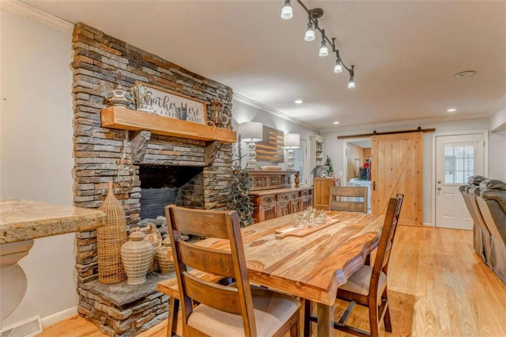 1522 Collard Valley Road Cedartown, GA 30125 - Photo 21 of 56 a dining room with a table and chairs