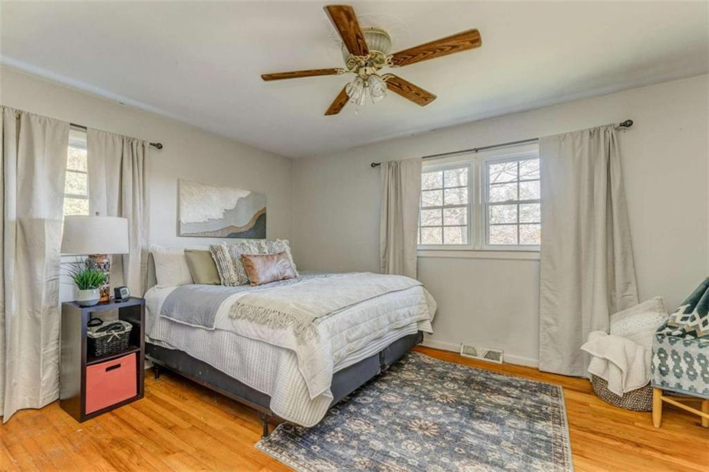 1522 Collard Valley Road Cedartown, GA 30125 - Photo 27 of 56 a bedroom with a bed and window