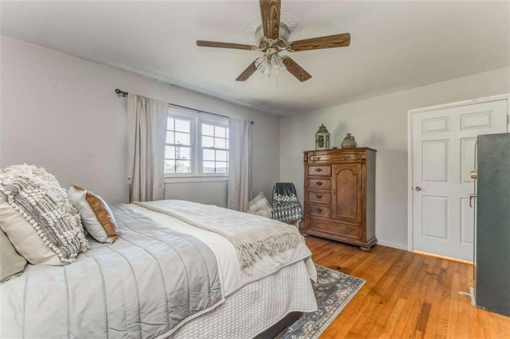 1522 Collard Valley Road Cedartown, GA 30125 - Photo 30 of 56 a bedroom with a bed dresser and a window