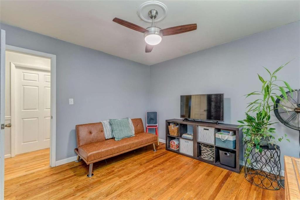 1522 Collard Valley Road Cedartown, GA 30125 - Photo 33 of 56 a living room with furniture and a flat screen tv