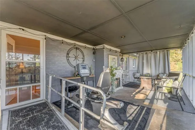 a view of house with outdoor space and shower