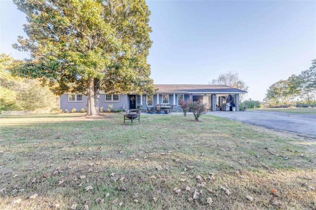 1522 Collard Valley Road Cedartown, GA 30125 - Photo 43 of 56 a view of house with outdoor space and shower