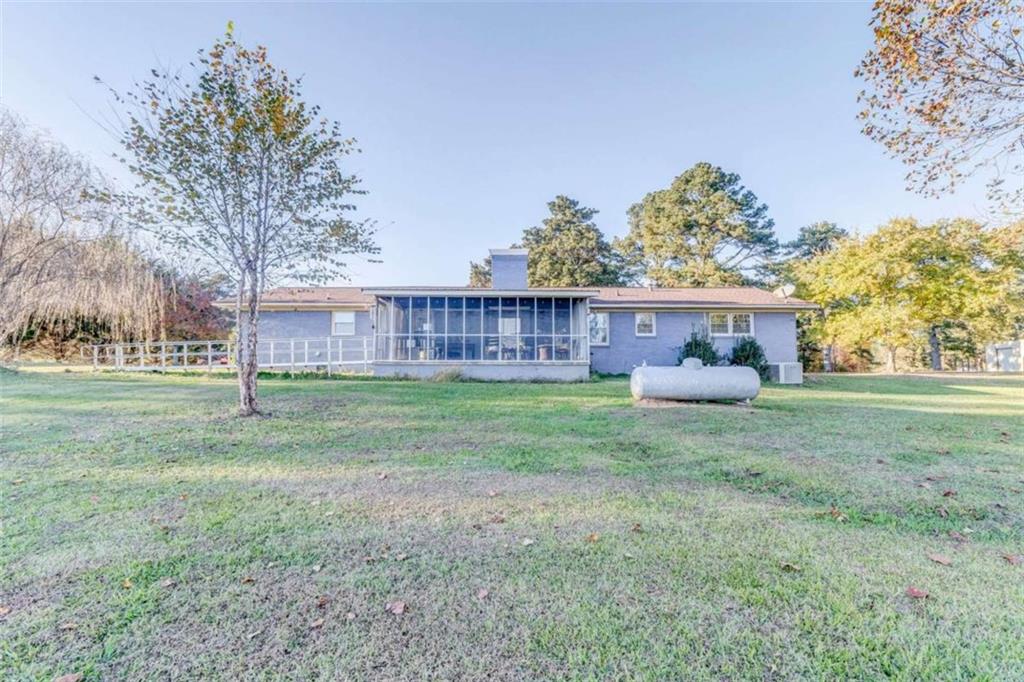 1522 Collard Valley Road Cedartown, GA 30125 - Photo 46 of 56 a view of a house with a back yard