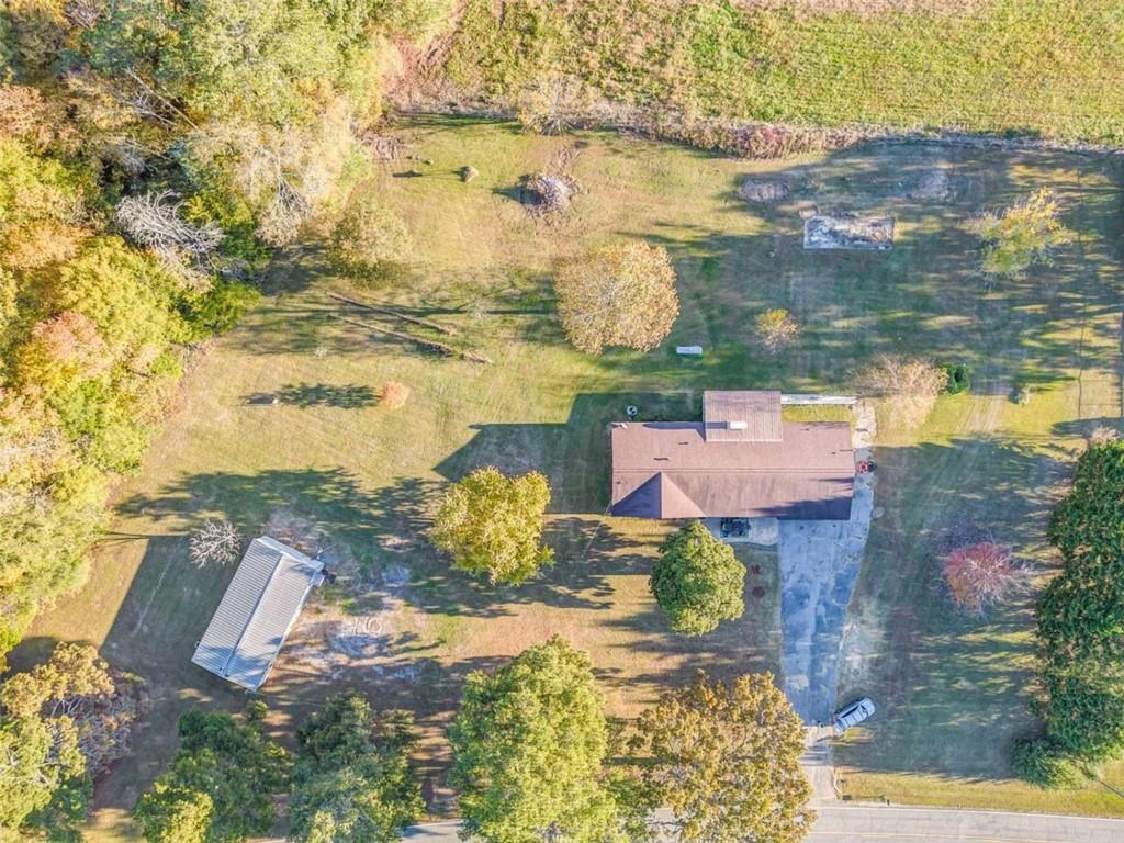 1522 Collard Valley Road Cedartown, GA 30125 - Photo 52 of 56 an aerial view of a house with a yard