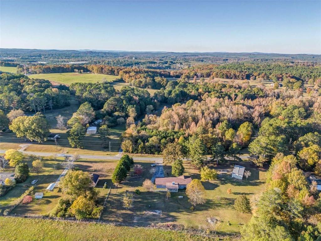 1522 Collard Valley Road Cedartown, GA 30125 - Photo 55 of 56 an aerial view of residential houses with outdoor space