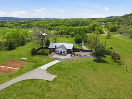 a view of a garden with an outdoor space